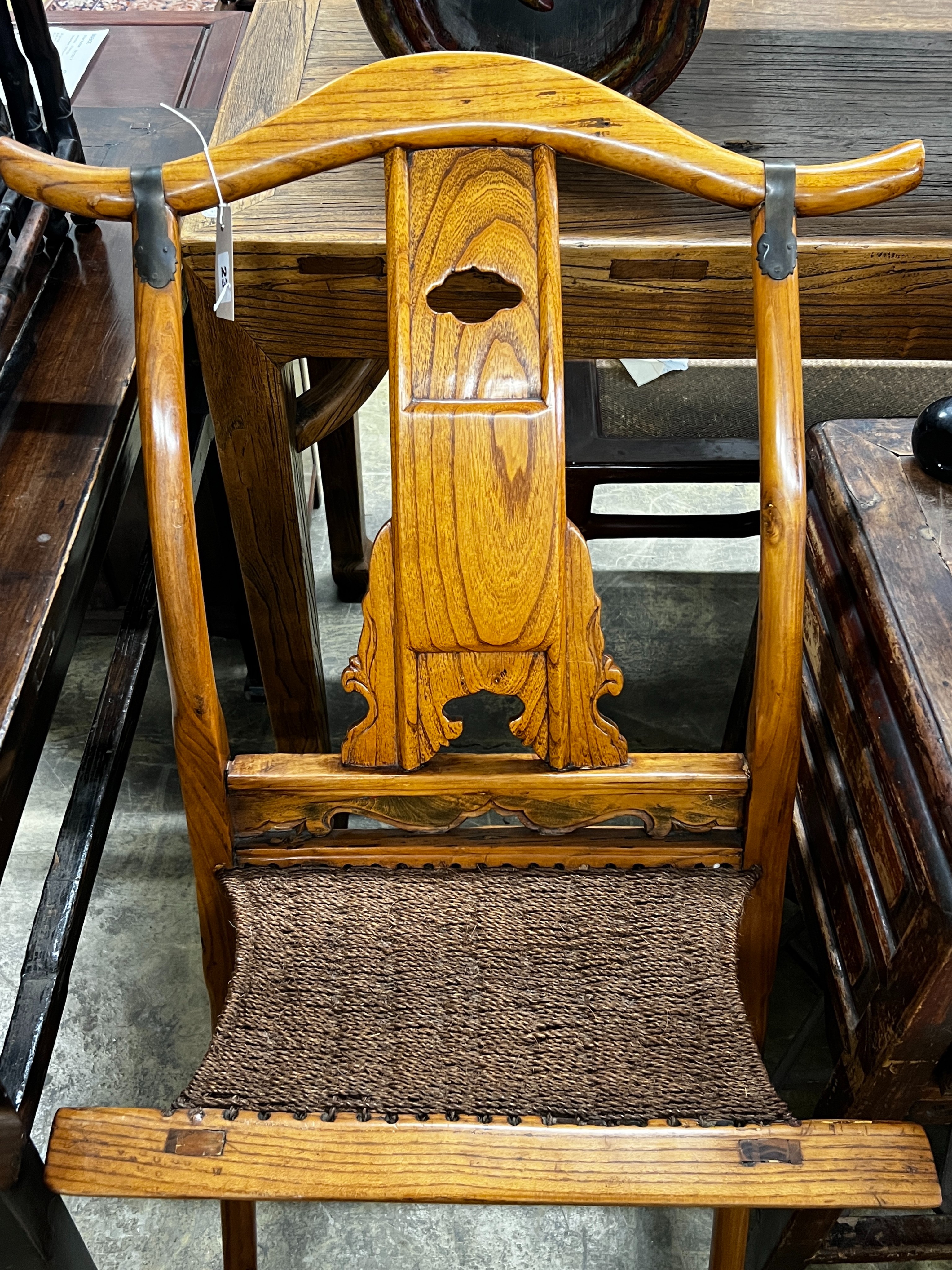 A Chinese elm folding hunting chair, height 105cm